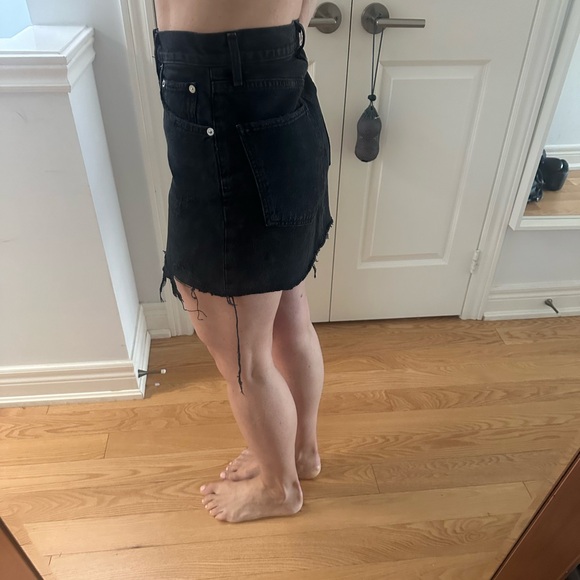AGolde size 25 black distressed style denim skirt. Worn once. Fits true tosize. - Picture 2 of 4